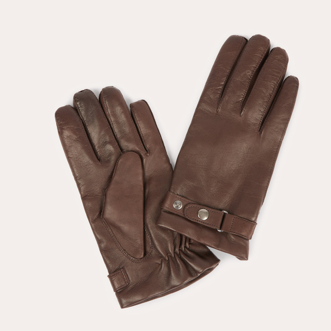 Brown leather gloves with tightening tab