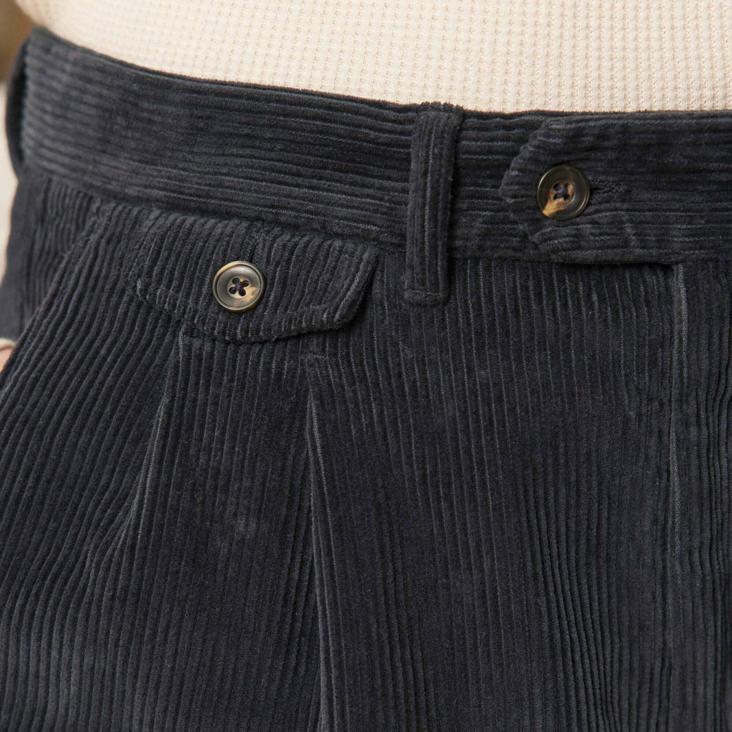 Double pleated navy corduroy pants