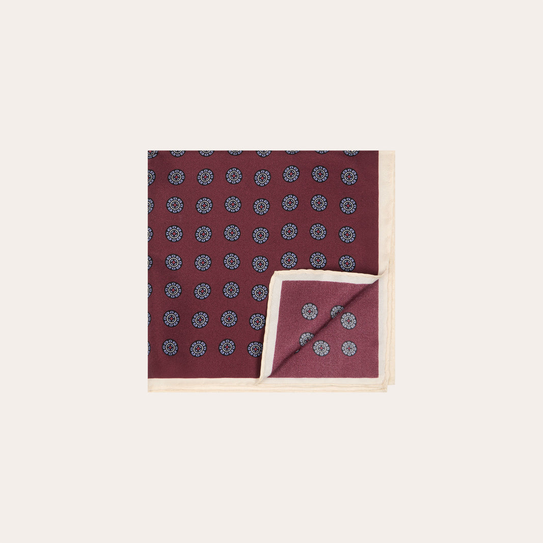 Burgundy patterned silk clutch